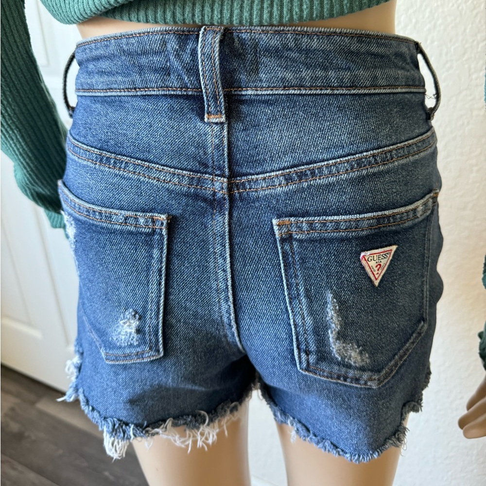 Guess medium wash distressed denim shorts